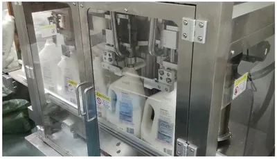 Full Automatic Double-Head Liquid Filling Machine for Complete Bottled Laundry Liquid